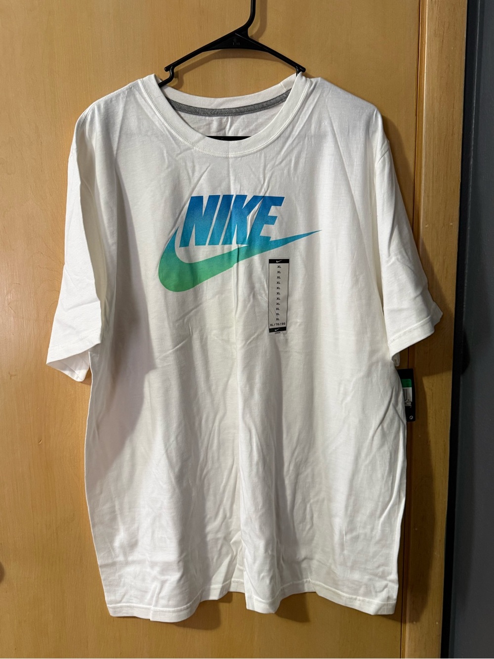 Nike White Short-Sleeve Tee with Blue-Green Gradient Logo
